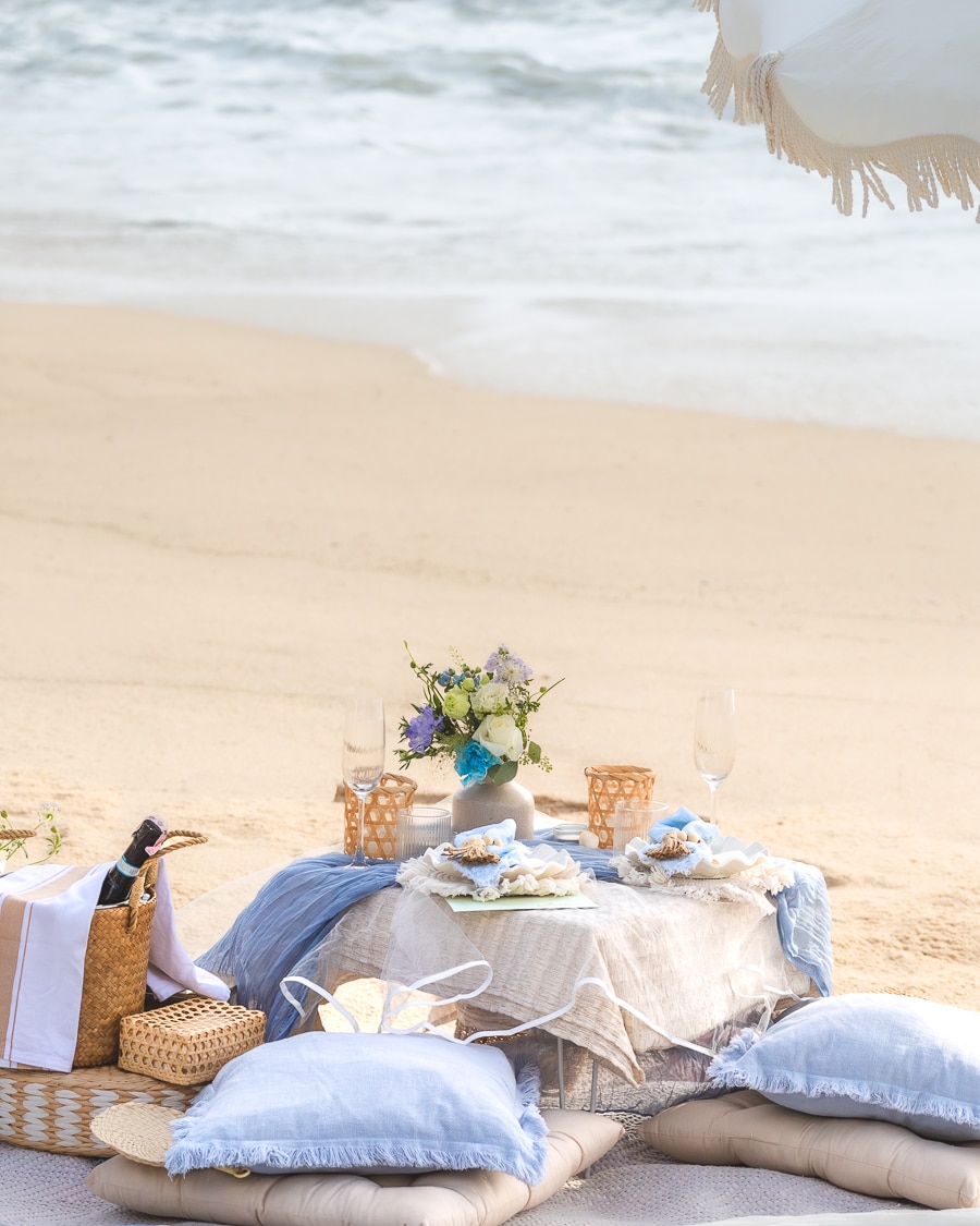 Phuket romantic proposal picnic decorated with flowers